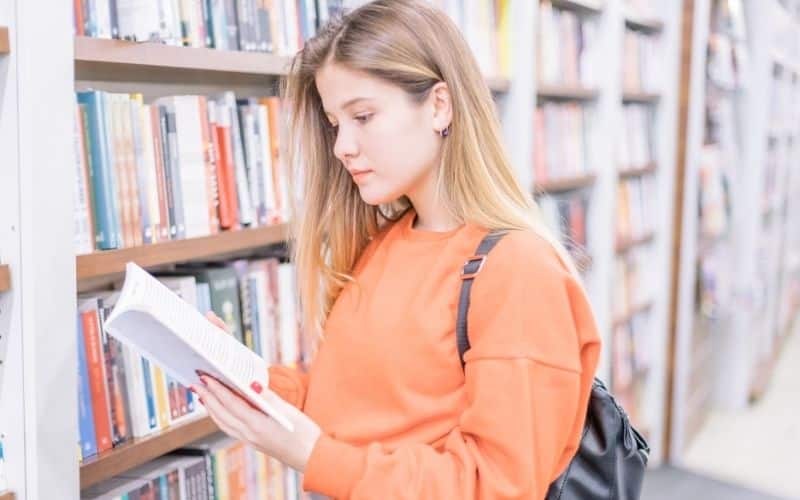 student reading a book