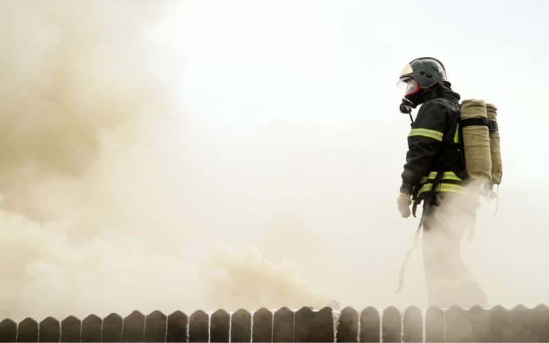 firefighter surrounded with smoke
