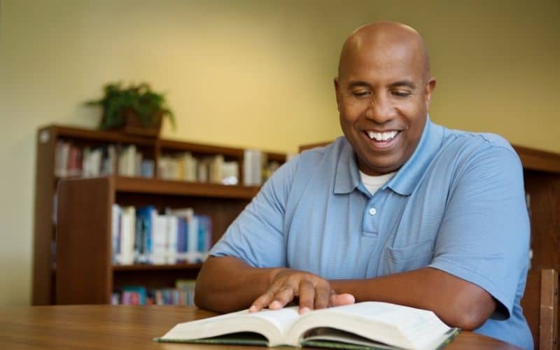 man reading a book