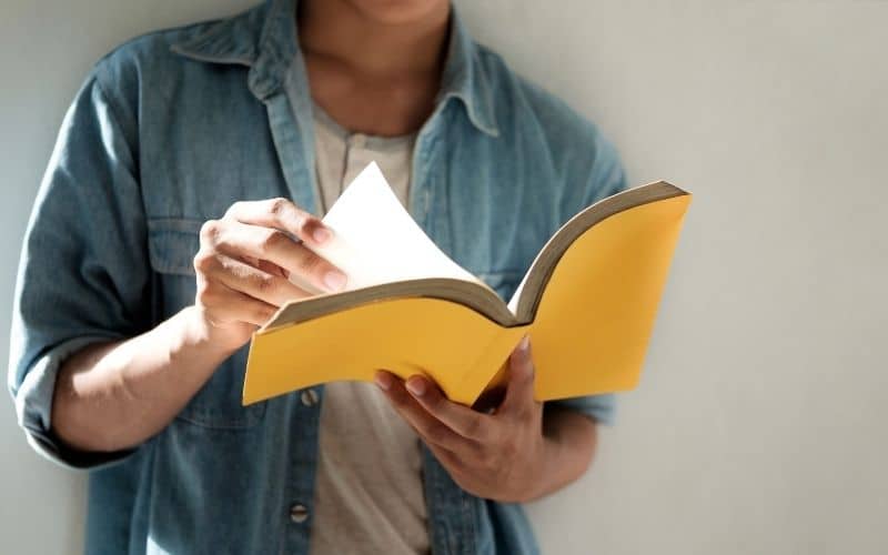 man reading a book