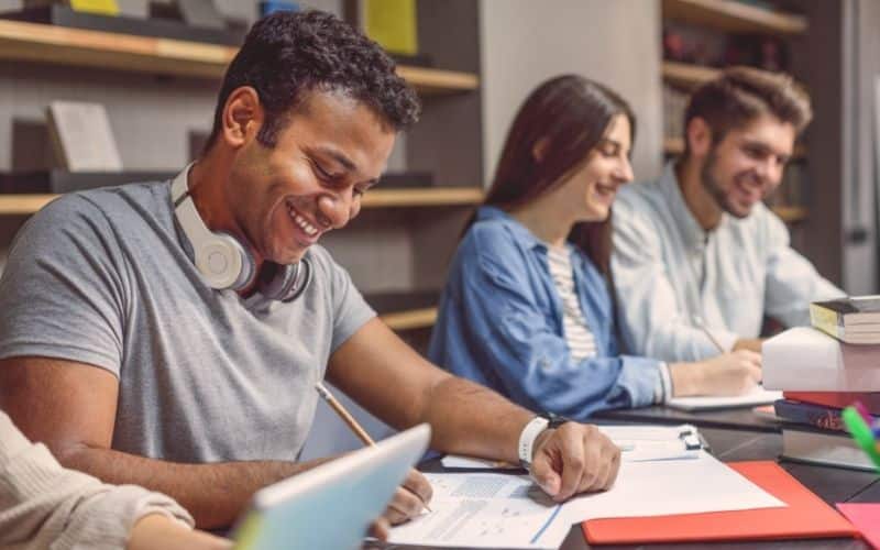 college students in library