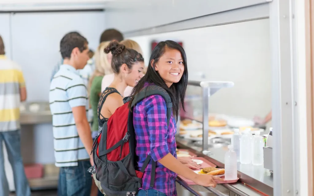 high school freshmen in cafeteria line