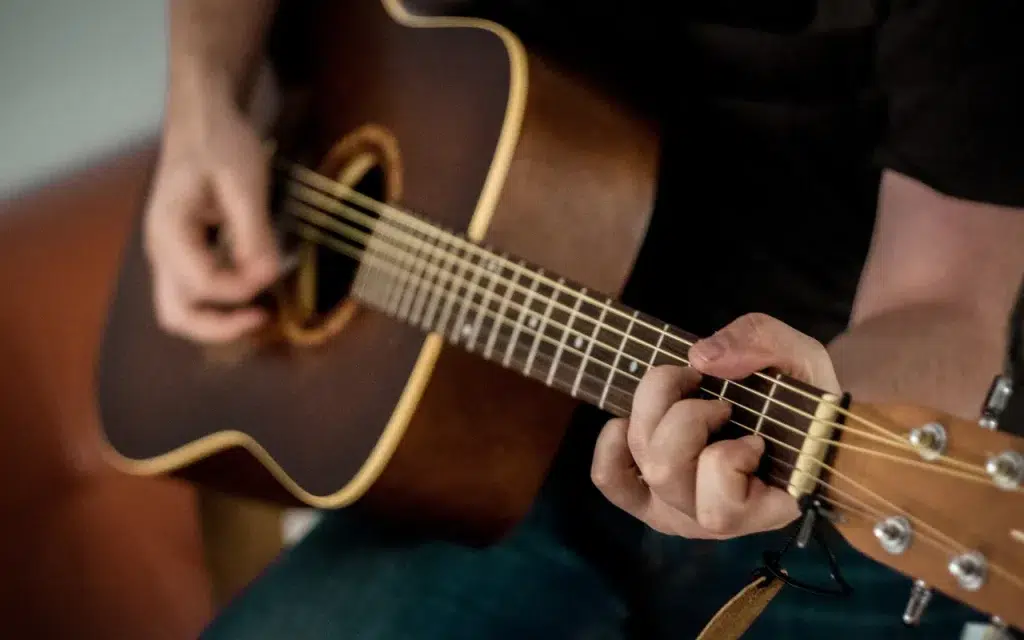 person playing guitar