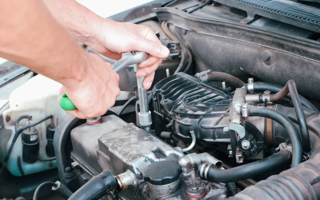 mechanic working on car