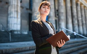 How Long Is Law School? Female law student in front of courthouse