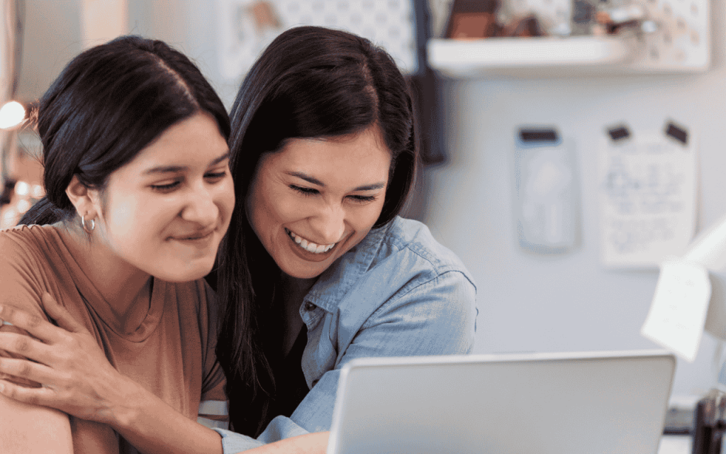 mother and daughter celebrate MBA acceptance email