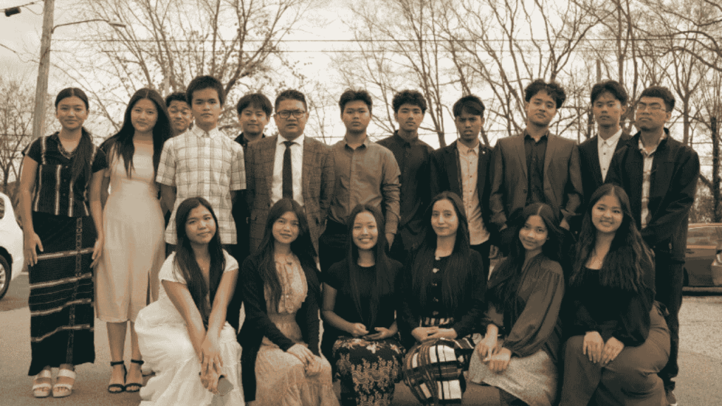 sepia tone photograph of graduating middle class students