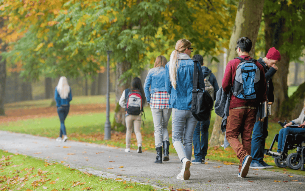 georgia students walk along tree-lined path