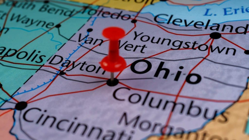 thumbtack stuck into map of ohio