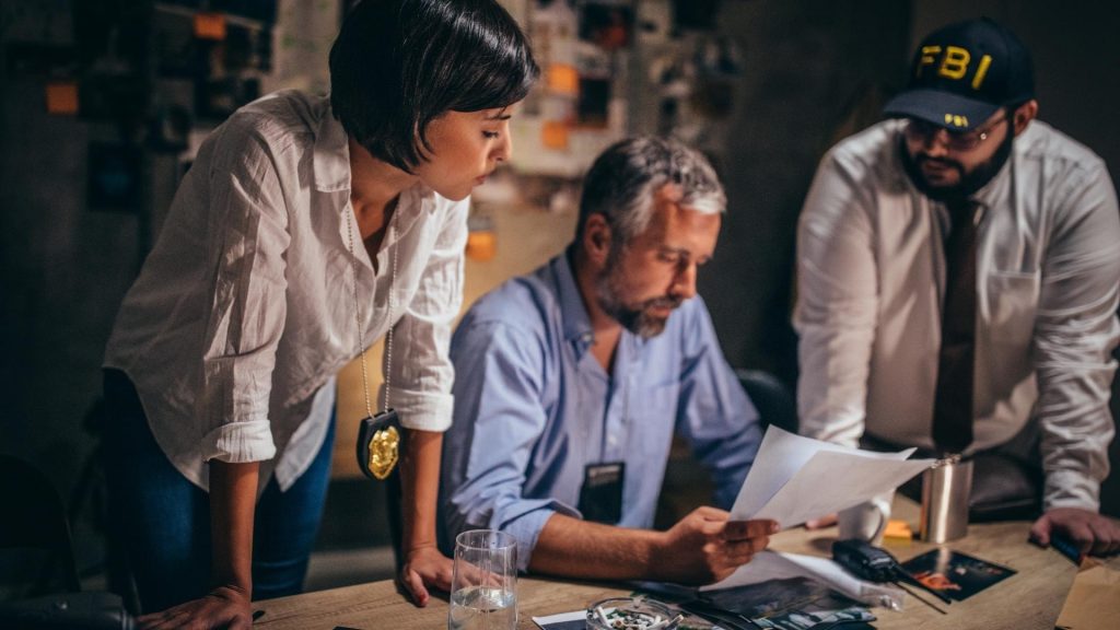 FBI agents review documents