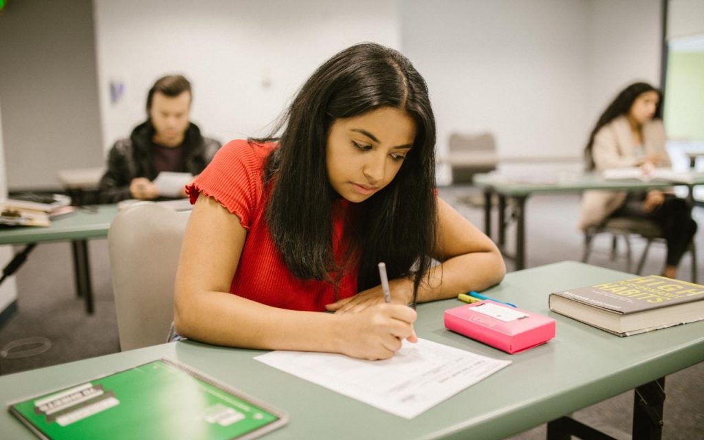 woman takes exam